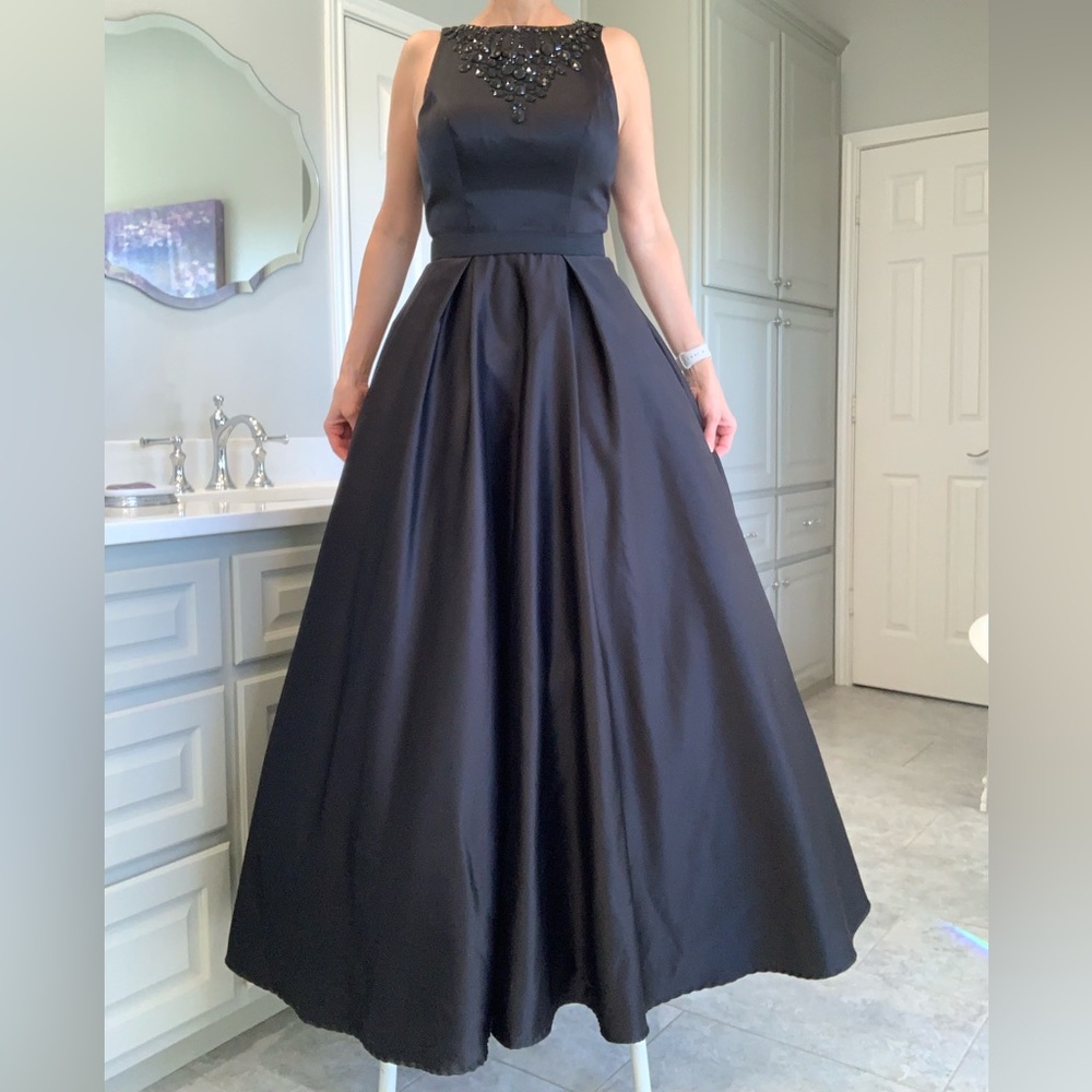 Beautiful black full length Madison James open back evening gown